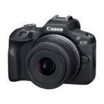 Canon EOS R100 mirrorless camera with RF-S 18-45mm IS STM lens three-quarter hero
