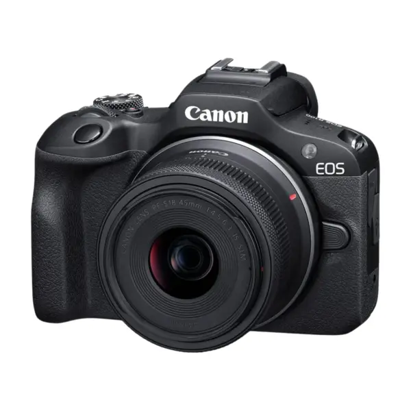 Canon EOS R100 mirrorless camera with RF-S 18-45mm IS STM lens three-quarter hero