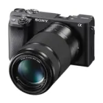 Sony Alpha a6400 mirrorless camera with 55-210mm telephoto lens attached