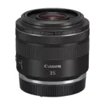 Canon RF 35mm F1.8 MACRO IS STM lens, angled front view with the RF rear dust cap fitted over the mount