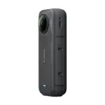 Insta360 X5 8K 360 camera in Midnight Black, opposite side view showing the card and battery door.