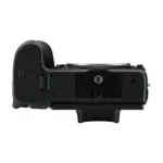 Nikon Z 5 mirrorless camera body, bottom view with the tripod socket and battery door