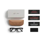 Ray-Ban Meta Wayfarer (Gen 2) smart glasses, Matte Black frame with Clear lenses, shown with the charging case, cable and documentation supplied in the box.