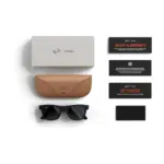 Ray-Ban Meta Wayfarer (Gen 2) smart glasses, Matte Black frame with Gradient Graphite lenses, shown with the charging case, cable and documentation supplied in the box.