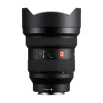 Sony FE 12-24mm F2.8 GM lens, side view showing the AF/MF switch, focus hold button, G badge, zoom scale and the E-mount marking