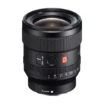 Sony FE 24mm F1.4 GM lens, angled front view showing the front element, focus ring, AF/MF switch, focus-hold button and aperture ring