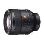 Sony FE 85mm F1.4 GM lens, angled view with the front element and aperture ring