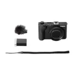 Canon PowerShot V1 compact camera with battery, wind muff and wrist strap