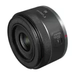Canon RF 16mm F2.8 STM lens, front three-quarter view showing the control ring and focus switch