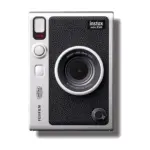 Fujifilm instax mini Evo hybrid instant camera in black, front view with the lens and effect dials