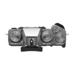 Fujifilm X-T5 mirrorless camera body in Silver - top view showing the shutter speed, ISO and exposure compensation dials.