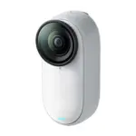Insta360 GO 3S action camera in Arctic White - angled view showing the lens and textured body.