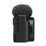 Sony ZV-1 II vlog camera in black, side view showing the microphone and USB Type-C ports